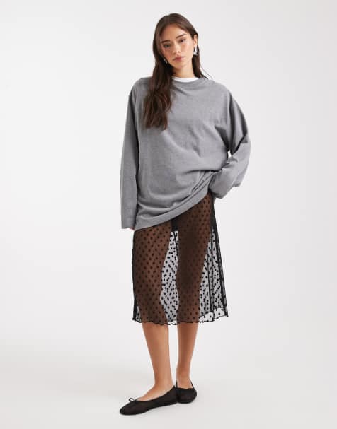 COLLUSION polka dot sheer mesh awkward length skirt in black