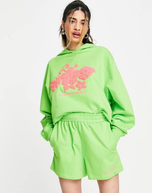 COLLUSION print branded sweat shorts in green (part of a set)