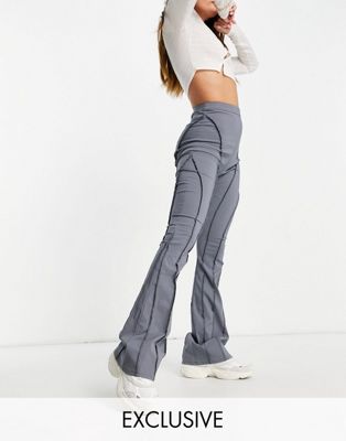 COLLUSION puddle flare trousers with busted seams in charcoal