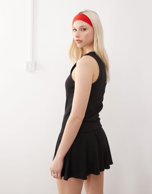 COLLUSION racer style rib mini frill dress in black