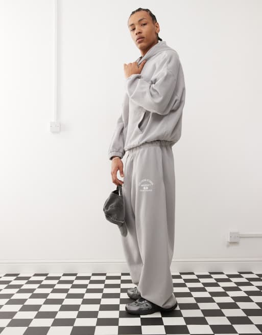 COLLUSION relaxed baggy joggers with print in grey