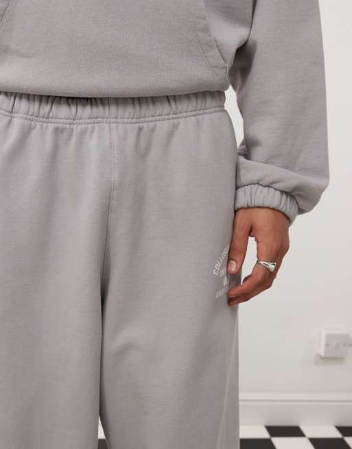 COLLUSION relaxed baggy joggers with print in grey