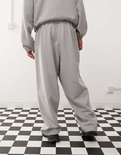 COLLUSION relaxed baggy joggers with print in grey