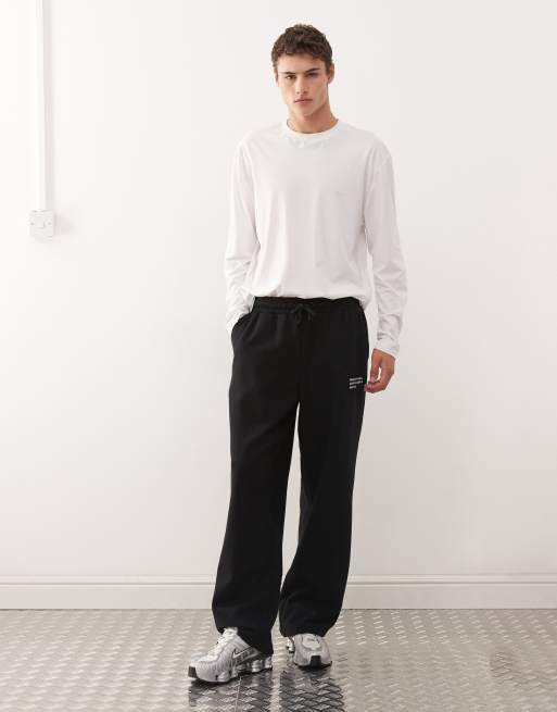 COLLUSION Relaxed black jogger with co-ordinates print