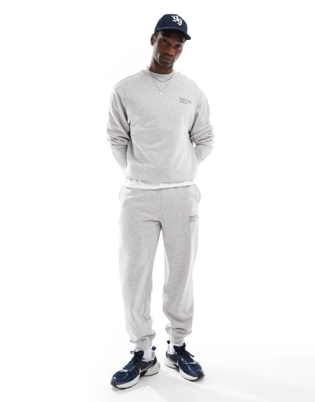 COLLUSION relaxed coordinate print skate sweatpants in gray