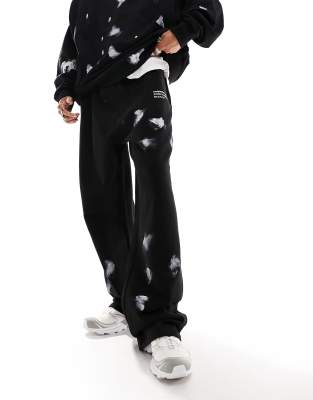 COLLUSION relaxed joggers with hand paint spray in black co-ord - ASOS Price Checker