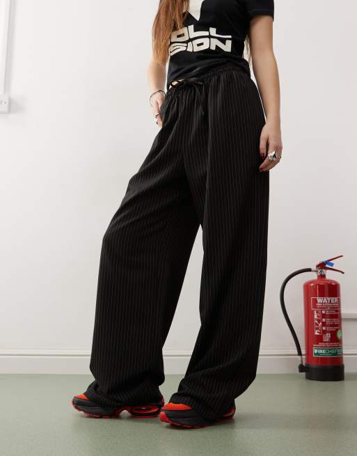 COLLUSION relaxed pull on pinstripe trousers in black