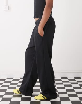 COLLUSION Relaxed skate sweatpants in black