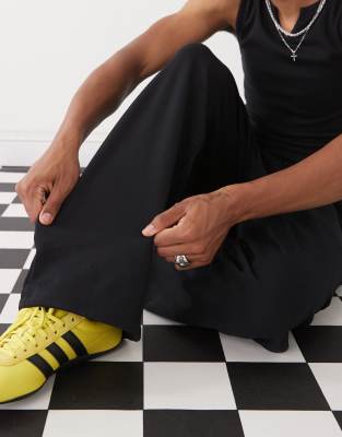 COLLUSION Relaxed skate sweatpants in black