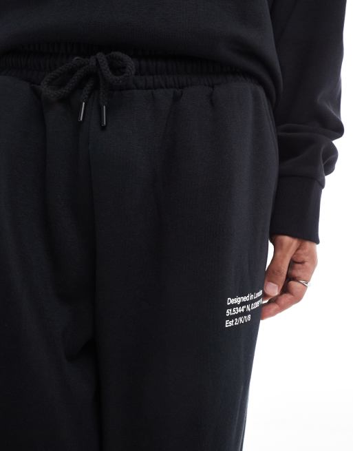 COLLUSION Relaxed skate sweatpants in black - part of a set