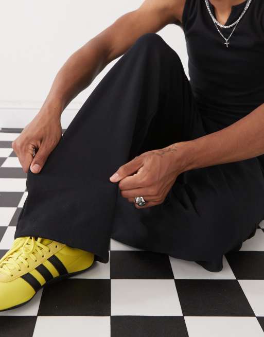 COLLUSION Relaxed skate sweatpants in black
