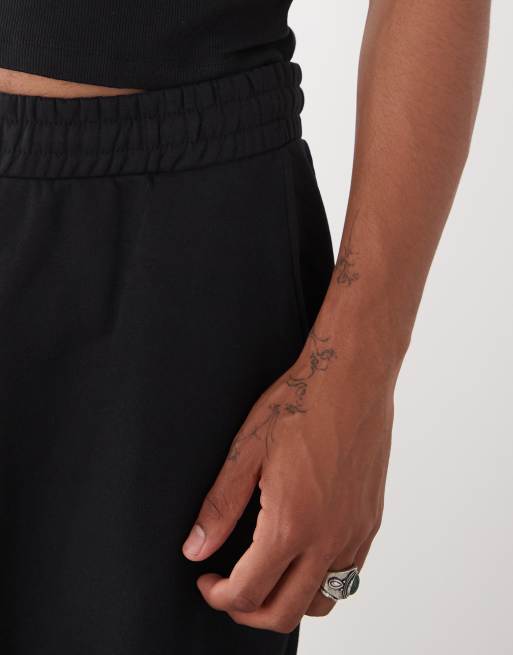 COLLUSION Relaxed skate sweatpants in black