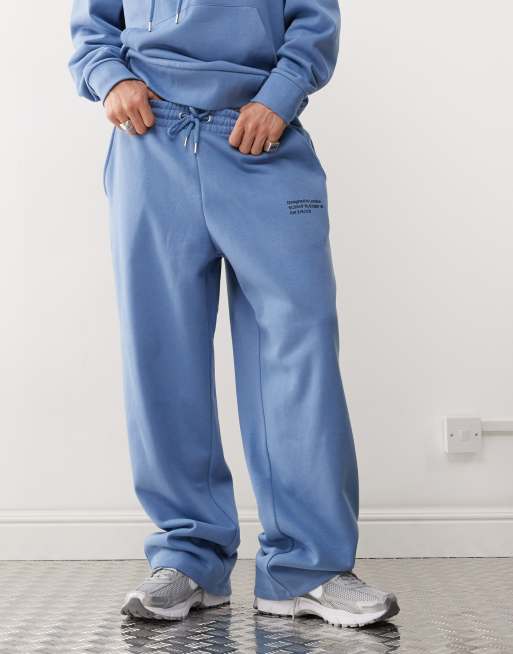 COLLUSION Relaxed skate joggers with co-ordinates in blue