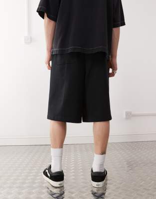 COLLUSION relaxed skater jersey jogger short in black