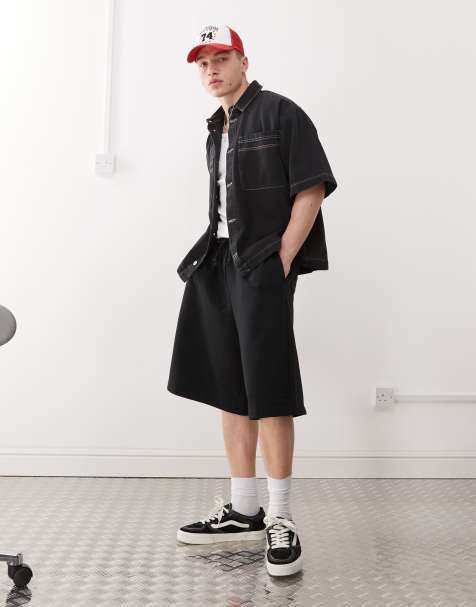 COLLUSION relaxed skater jersey trackie shorts in black - view 1