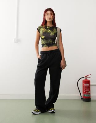 Collusion relaxed straight leg trackies in black