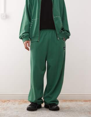 Collusion COLLUSION relaxed studded joggers in green with studded detail