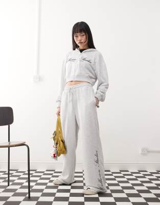 relaxed sweatpants with logo in gray heather - part of a set