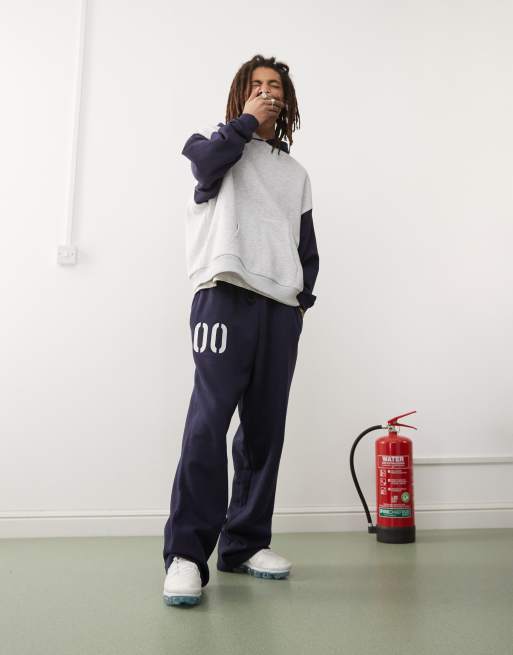 COLLUSION relaxed trackies with print in navy (part of a set)