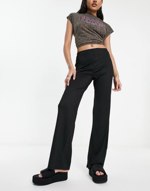 COLLUSION slinky flare trousers in black