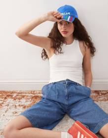 Princess Polly Henesey raw hem high waisted wide leg jeans in mid blue wash