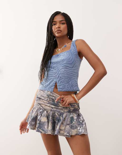 COLLUSION ruched low rise mini skirt in camo print