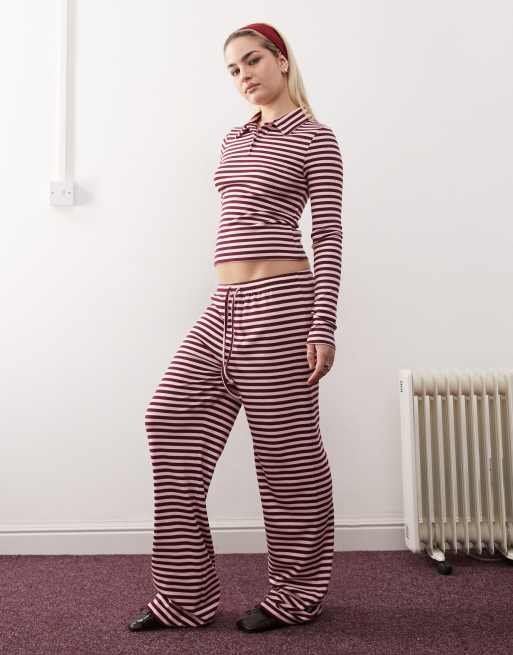 COLLUSION - Ruimvallende broek met halfhoge taille en wijde pijpen in rozebruine streep
