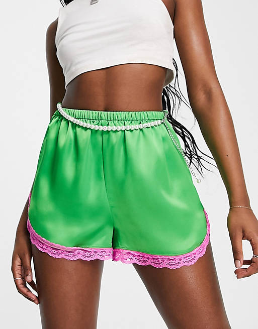 COLLUSION satin running shorts with chain belt in green