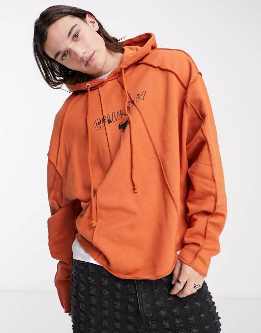 COLLUSION seam detail logo hoodie in orange