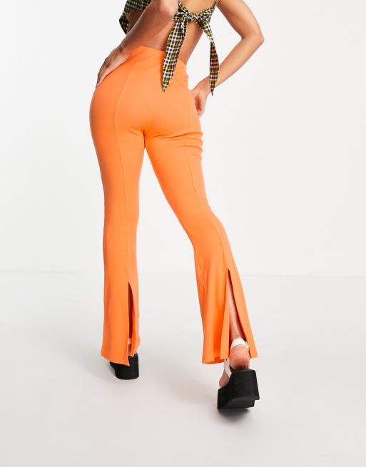 COLLUSION seam slit legging flares in orange, 2 of 4