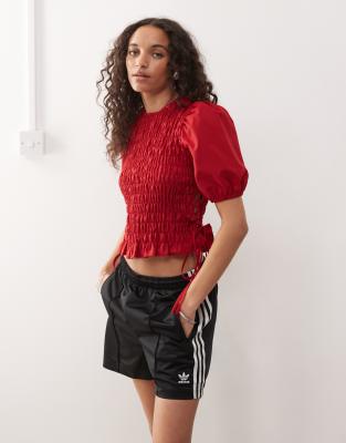 shirred top with lace-up detail at side in red