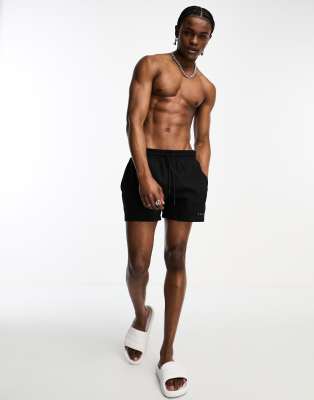 COLLUSION shorter length swim short in black - ASOS Price Checker