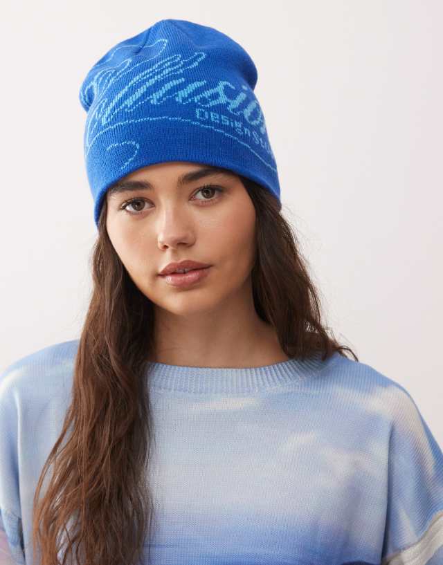 COLLUSION skull cap beanie with graphic logo in blue | ASOS