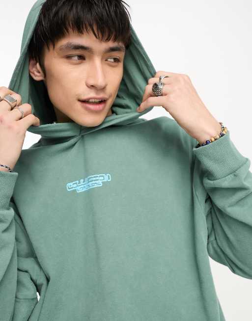 COLLUSION skull print hoodie in washed dark green