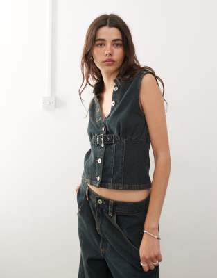 sleeveless denim shirt in green cast - part of a set