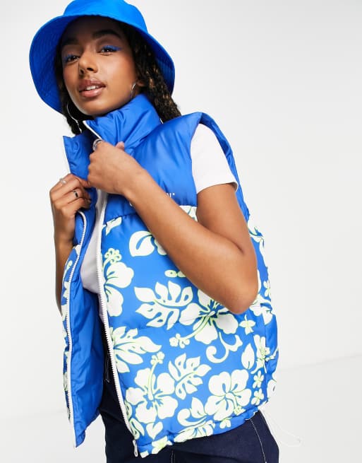 COLLUSION sleeveless puffer vest with blue floral print