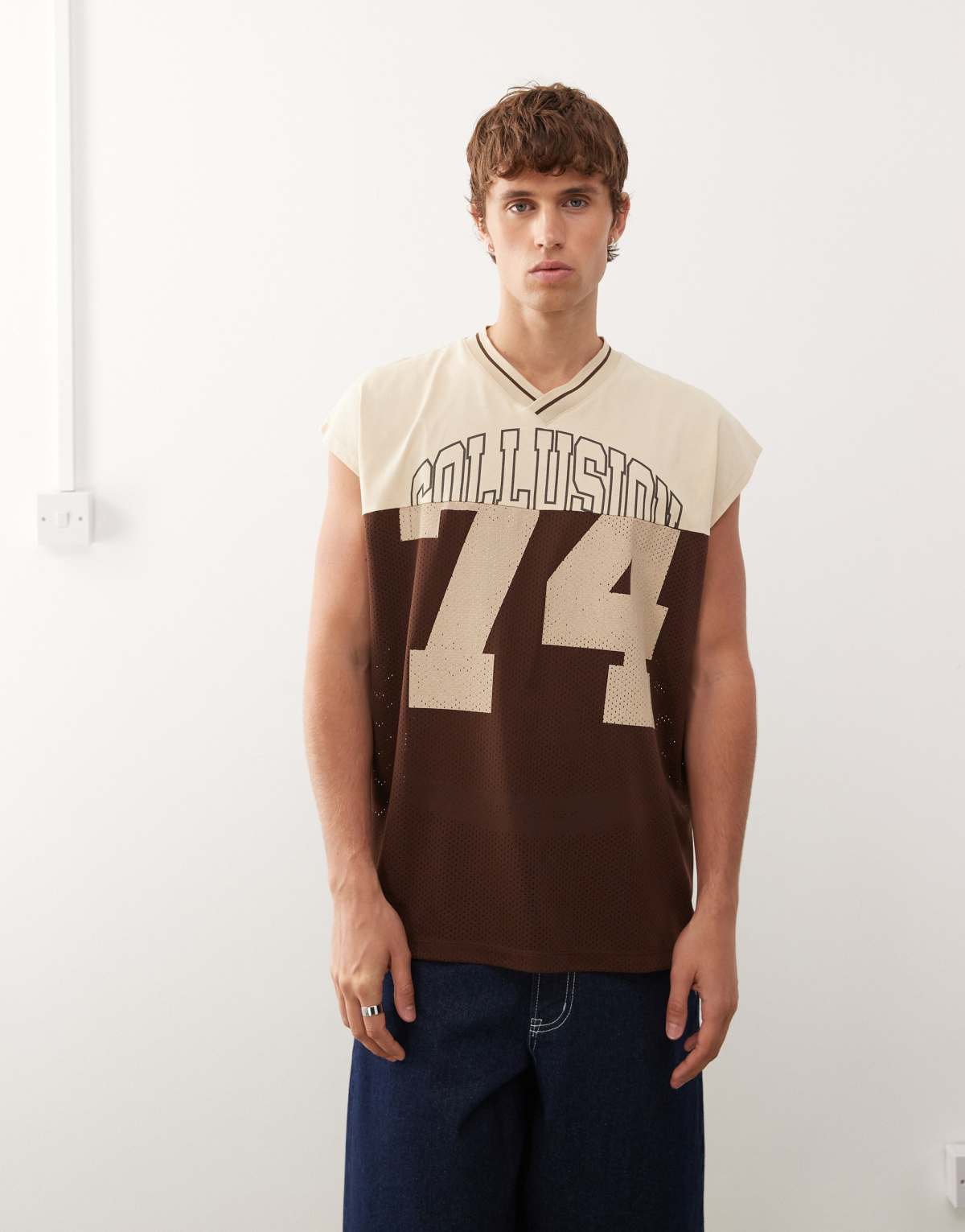 COLLUSION Spliced basketball vest in brown