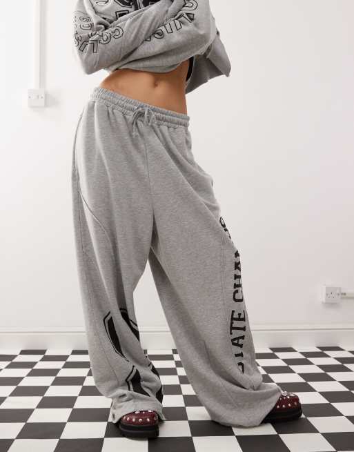 COLLUSION spliced print applique relaxed trackies in grey (part of a set)
