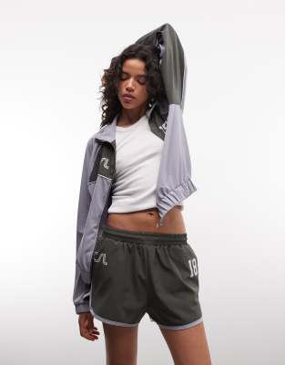 COLLUSION sports dolphin hem nylon runner short co-ord