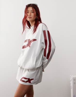 Collusion COLLUSION sports nylon track jacket with print in grey