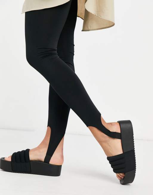 New Balance life in balance stirrup leggings in black Exclusive at ASOS