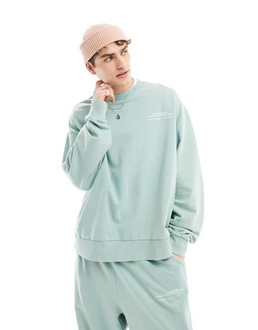COLLUSION STUDIOS - Sweatshirt i blågrøn vask - Del af sæt