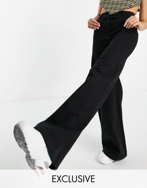 COLLUSION super flare trousers in black