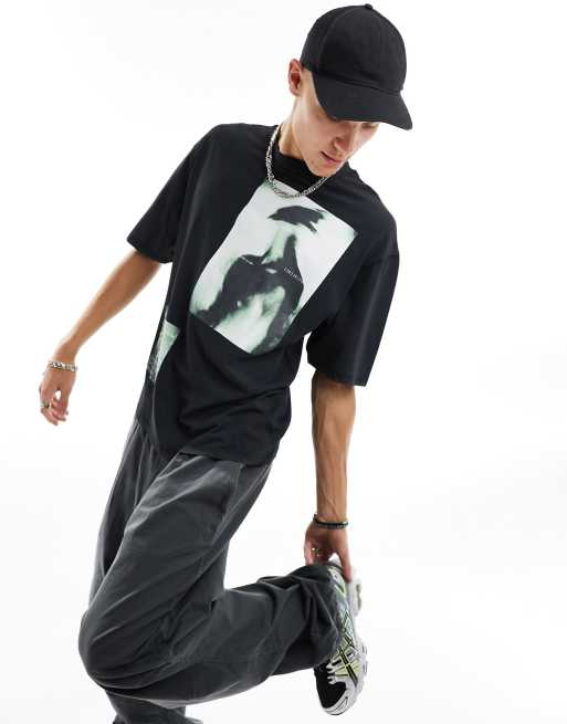 COLLUSION – Svart oversize-t-shirt med fototryck
