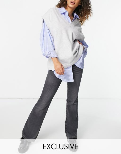 COLLUSION – Svarta utsvängda slouchy jeans med låg midja