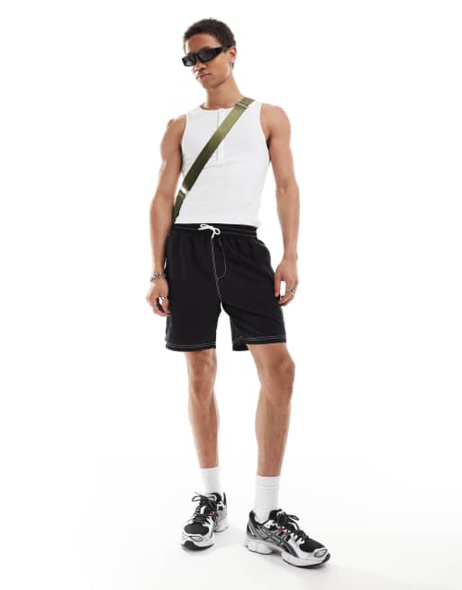 COLLUSION swim shorts with contrast stitch in black