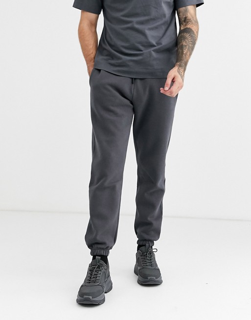COLLUSION tapered joggers in dark grey
