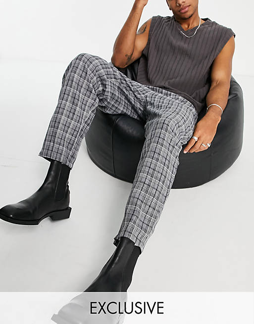 COLLUSION tapered trouser in black & beige check