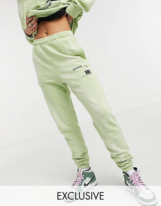 COLLUSION text print bleached wash skinny joggers co-ord in green