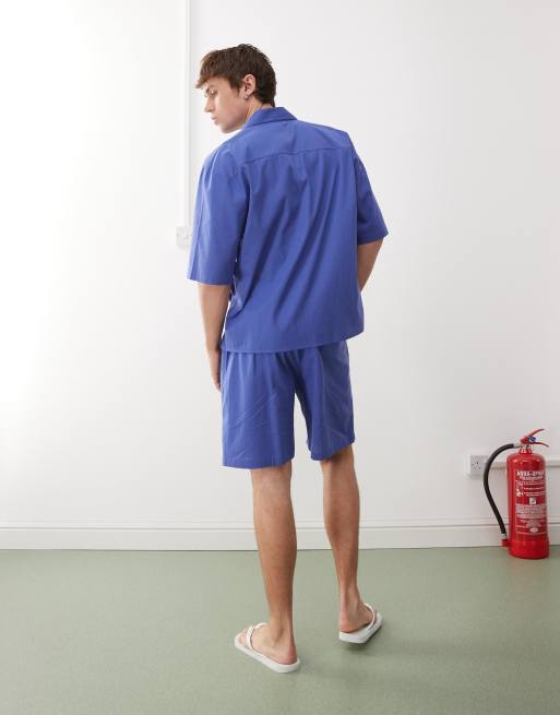 COLLUSION textured woven shorts in blue stripes